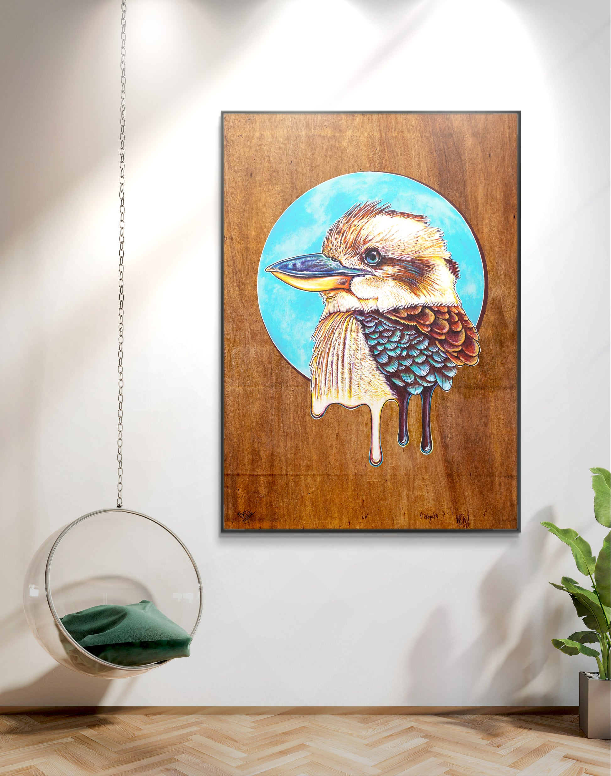 Canvas print of a colorful acrylic illustration on plywood of a native Australian Kookaburra bird by Skotty Fairclough hanging in a home décor setting